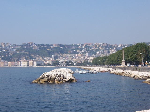 Mergellina as seen from Castel dell'Ovo with Villa Comunale in the foreground.